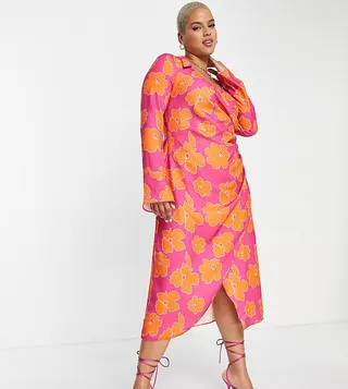 ASOS DESIGN Curve 70s drape front wrap midi dress in orange with pink floral