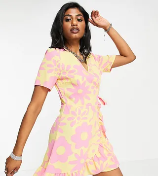 Only Exclusive wrap ruffle hem mini dress in 70s yellow floral