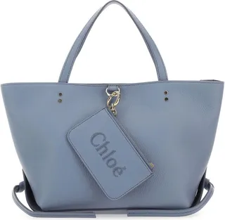 Shady cobalt Powder Blue Leather Small Chloé Sense Handbag from Chloé Handbag realized in pebble calf leather enriched by detachable tonal leather coin purse with embroidered logo.