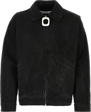 Jacket realized in pure cotton denim enriched by contrasting logoed leather patch at the back.
