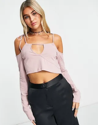 Weekday Zenia cutout long sleeve crop top in pale pink