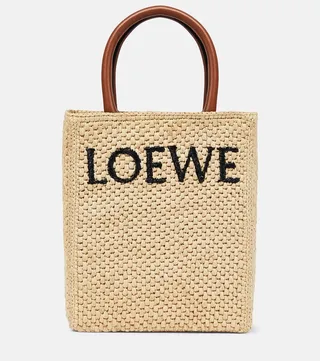 Leather-trimmed raffia tote bag