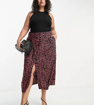 ASOS DESIGN Curve button through midi skirt with split in abstract orange print