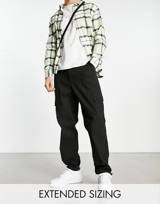 ASOS DESIGN cargo tapered pants in black with toggles