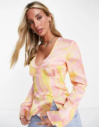 ASOS DESIGN V-neck satin long sleeve top in abstract pink & yellow print