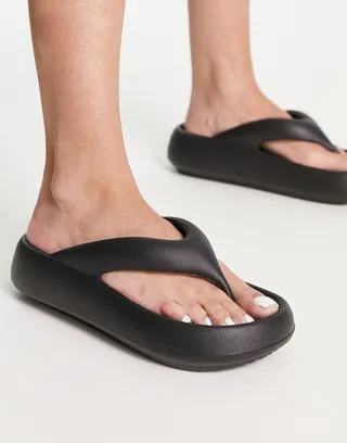 Truffle Collection molded flip flops in black