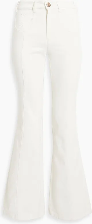 Broderie anglaise-trimmed high-rise flared jeans