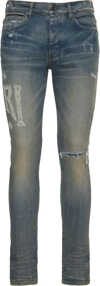 Amiri logo distressed jeans