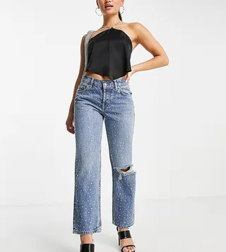 ASOS DESIGN Petite cotton blend low rise straight leg jeans in all over diamante hotfix with ripped knee - MBLUE