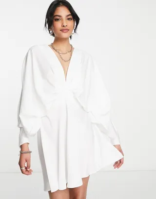 ASOS DESIGN batwing satin mini dress with bias cut skirt and tie back in ivory