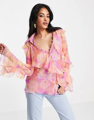 ASOS DESIGN v neck ruffle blouse with frill detail and button edge in pink pastel floral print
