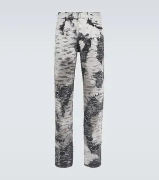 Distressed slim jeans