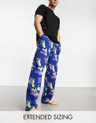ASOS DESIGN lounge bottoms in black dinosaur print