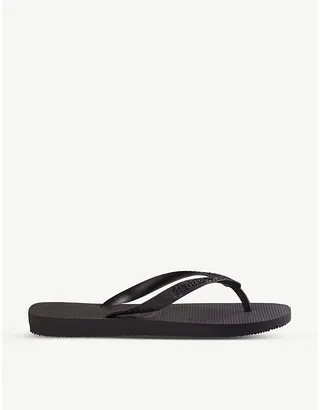 Womens Black Logo-embossed Rubber Flip-flops