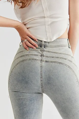 CRVY Head Turner Slim Flare Jeans by We The Free at Free People