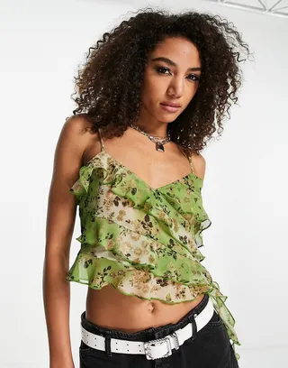 ASOS DESIGN bias cami in green ditsy with ruffle detail