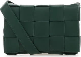 Crossbody bag realized in lamb leather characterized by iconic Intrecciato motif on the entire surface.