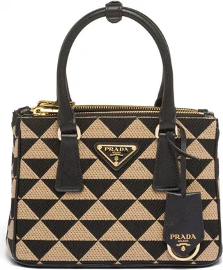 Symbole embroidered fabric mini bag