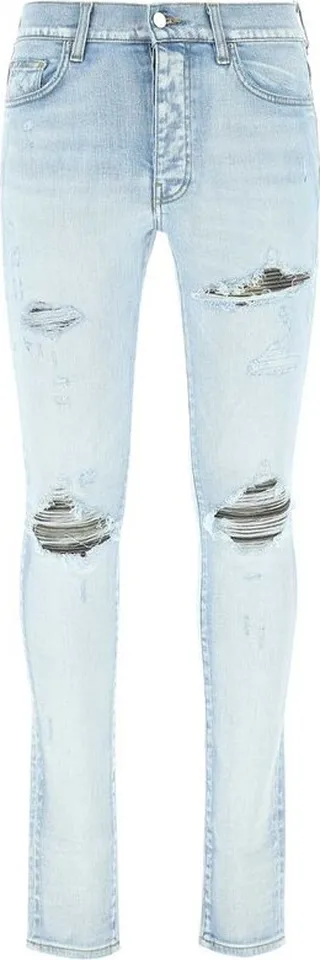 Amiri Logo-Patch Distressed Skinny Jeans