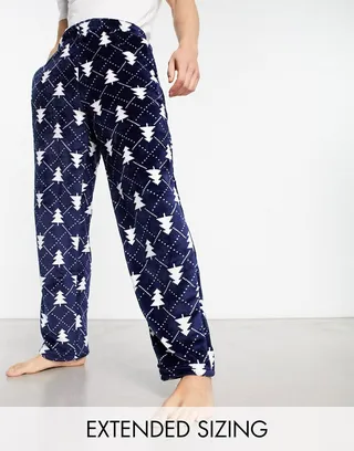 ASOS DESIGN fleece lounge bottoms in navy Christmas tree print