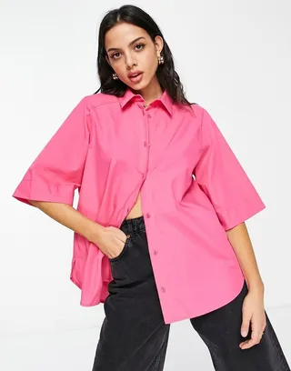 ASOS DESIGN oversized short sleeve shirt with shoulder pad in bright pink
