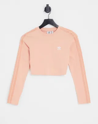 adidas Originals Relaxed Risque long sleeve crop top in blush