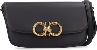 Trapezio flap leather shoulder bag