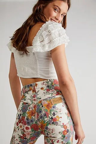 Wrangler Westward High-Rise Flare Jeans by Wrangler at Free People
