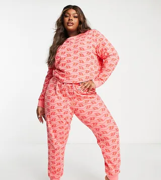 ASOS DESIGN Curve lounge monogram print sweatshirt & sweatpants set in pink & red