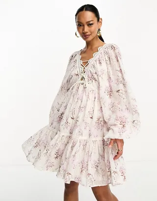 ASOS DESIGN lace trim plunge batwing mini dress with pep hem in lilac floral texture