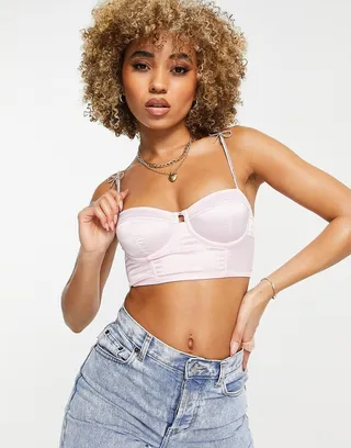 ASOS DESIGN Premium Emmeline satin corset with rhinestone bow straps in baby pink