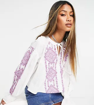 Reclaimed Vintage limited edition prarie blouse in white with contrast embroidery