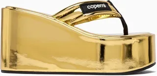 Solid Color Flip Flops In Laminated Leather. Wide Padded Front Straps That Keep The Foot In Place For A Stable Fit. Contrast Silicone Logo On The Outside. Solid Rubber Platform Sole Covered In Tone. Logo Case Supplied. Sole Height: Approx. 5. 5