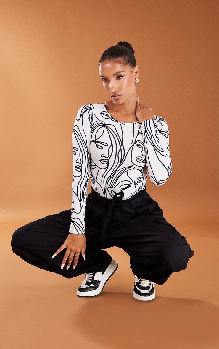 Abstract Face Print Crew Neck Long Sleeve White Bodysuit
