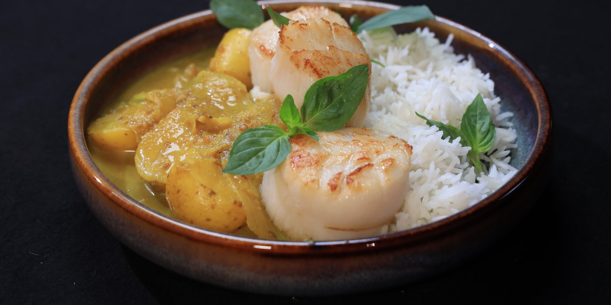 Gele curry met coquilles