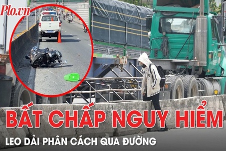 Dù đã xảy ra tai nạn, người dân vẫn bất chấp leo dải phân cách qua đường