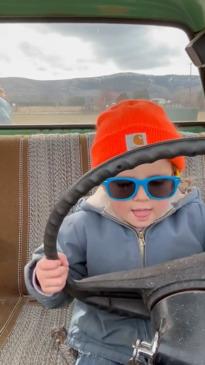 Three year-old ute driver helps dad on the farm