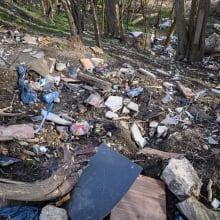 Residents call for clean up of encampment trash before it winds up in Thames River