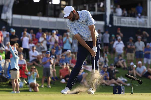 Scottie Scheffler receives neck treatment at The Players