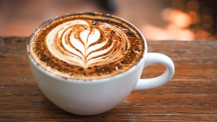 Upgrade Your At-Home Latte With A Dusting Of Chocolate Powder