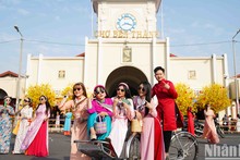 Ao Dai designs bring Tet atmosphere to Ho Chi Minh City’s streets