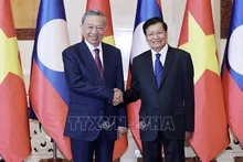 [In Pictures] President To Lam holds talks with Party General Secretary and President of Laos Thongloun Sisoulith