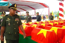 Dong Thap holds memorial and reburial services for remains of 97 martyrs