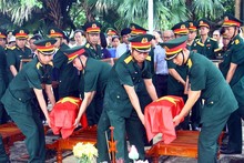 Quang Binh holds memorial, reburial services for martyrs' remains