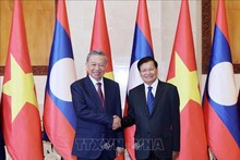 Vietnam, Laos agree to further bolster all-round cooperation