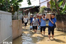 More assistance delivered to typhoon, flood victims