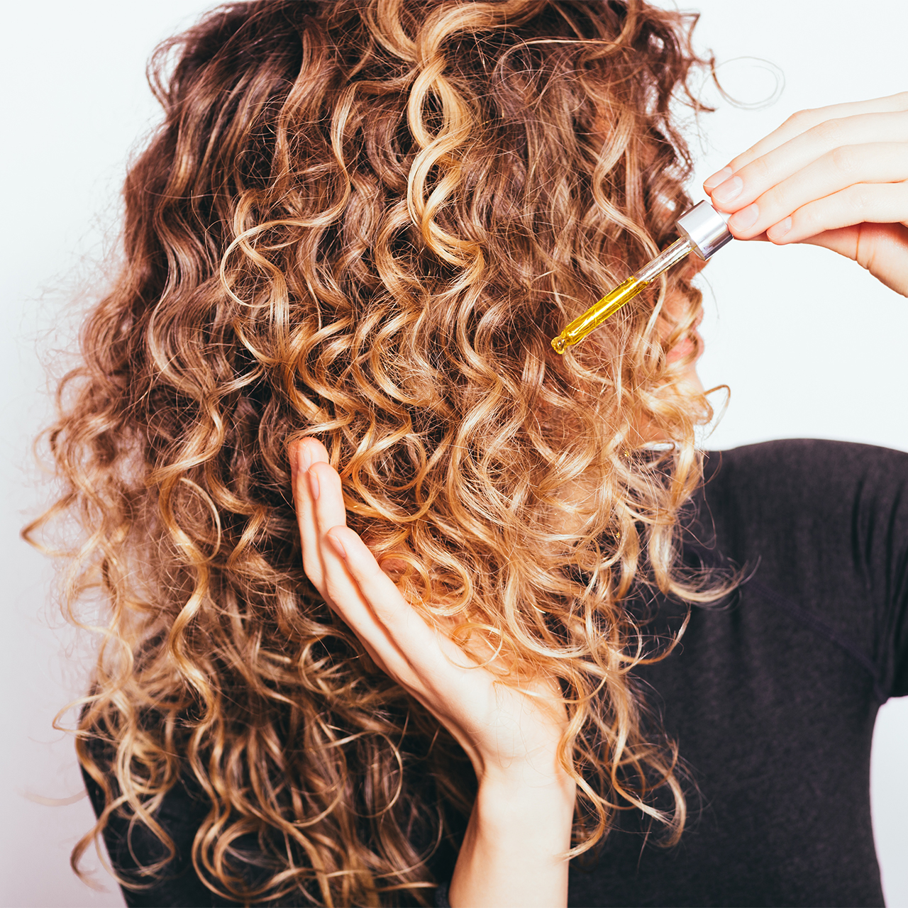 4 Ultra-Strengthening Hair Oils To Use Daily For Thicker, Healthier Strands