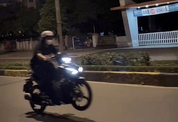 Young woman booked for doing wheelie in north-central Vietnam