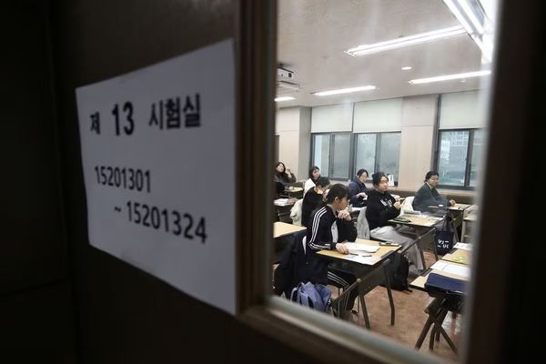 South Koreans take first mask-free college exam since pandemic