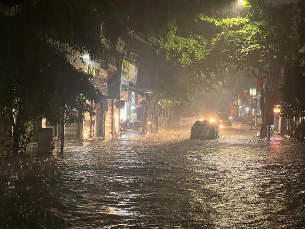 Downtown streets drowned by drawn-out downpour in Hanoi